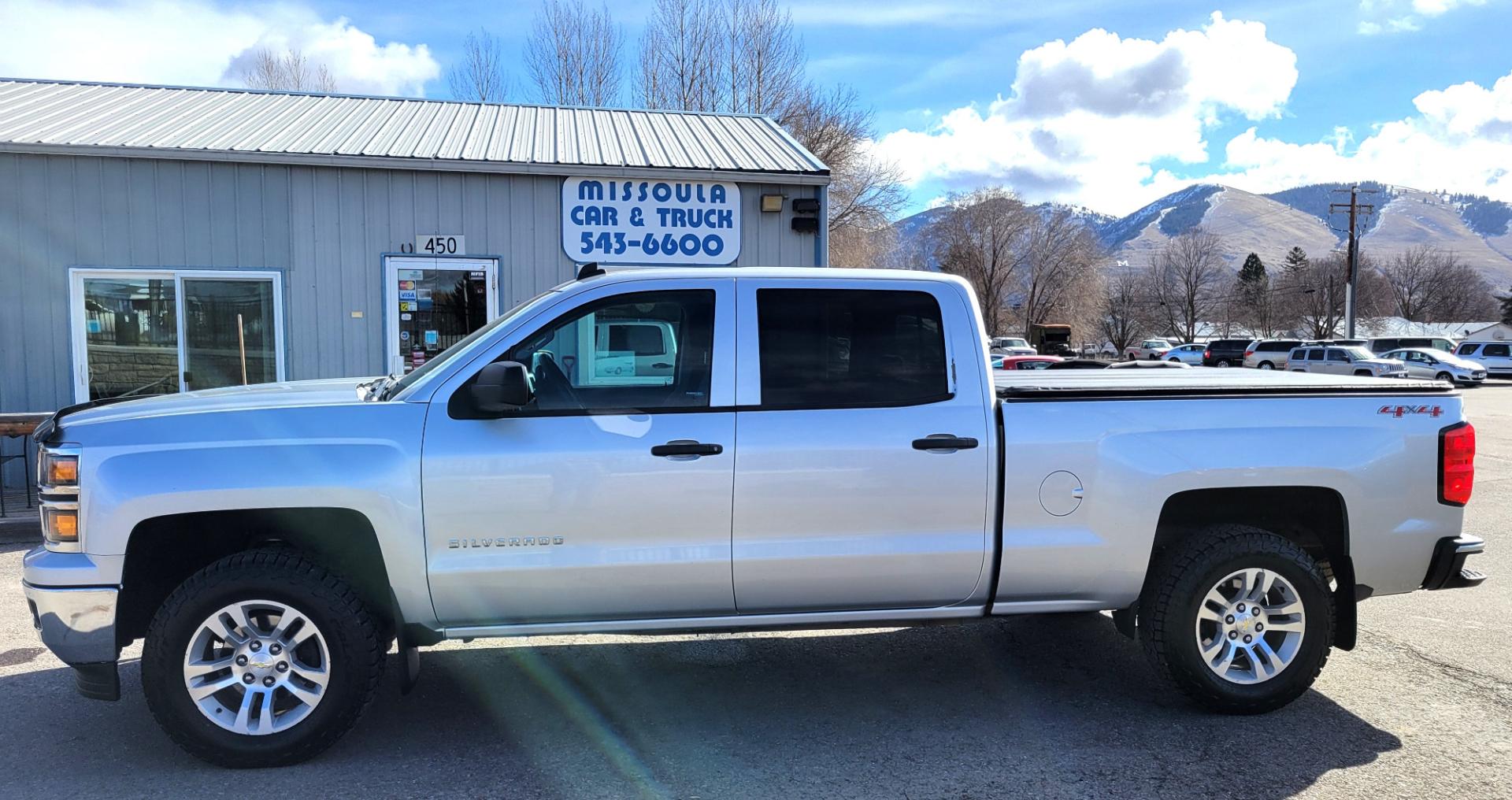 2014 Silver /Gray Chevrolet Silverado 1500 LT (3GCUKRECXEG) with an 5.3L V8 engine, 6 Speed Auto transmission, located at 450 N Russell, Missoula, MT, 59801, (406) 543-6600, 46.874496, -114.017433 - Nice 4WD. 5.3L V8. 6 Speed Automatic Transmission. Bose Sound System. Navigation. Bluetooth. Backup Camera. Remote Start. Power Drivers Seat. Towing. Rear Parking Sensors. - Photo#0